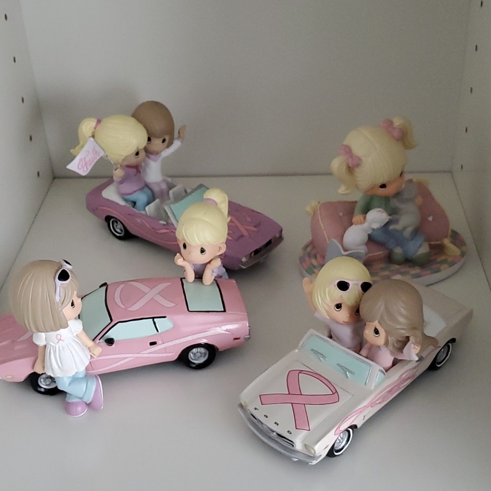 Set of 4 precious moments figures